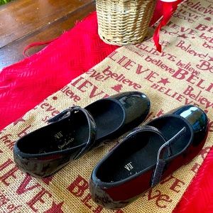 Gently worn black tap shoes